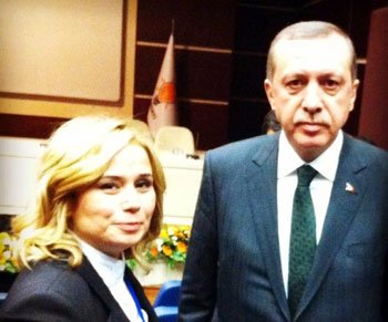 Erdoğan,Mutlu Aydemir'i tebrik etti.