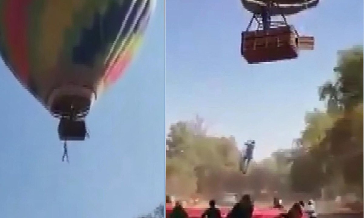 Sıcak hava balon turu sırasında sepetten bir kişi sarktı